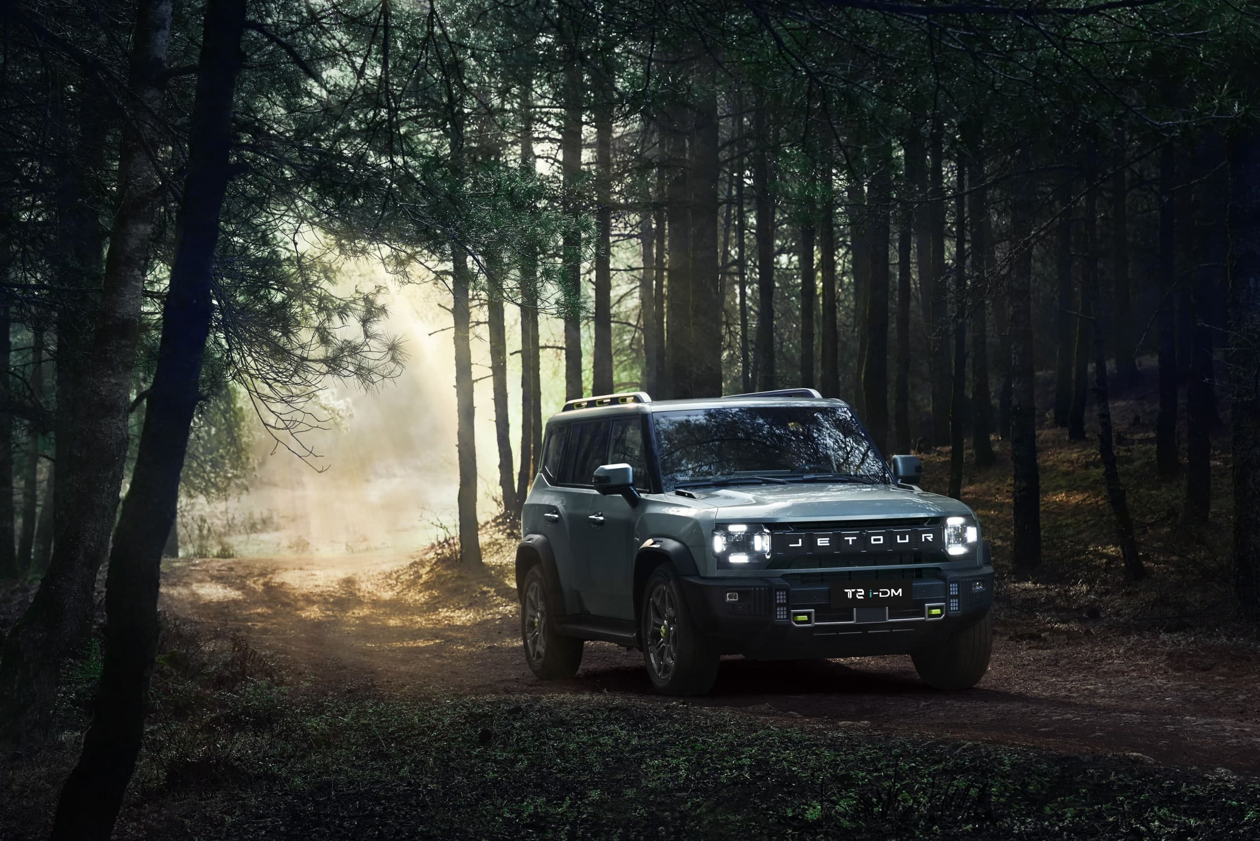 Jetour T2 SUV on a misty forest trail